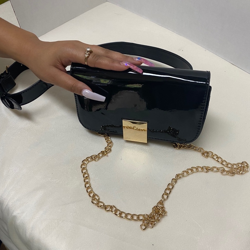Black and gold patent leather mini bag